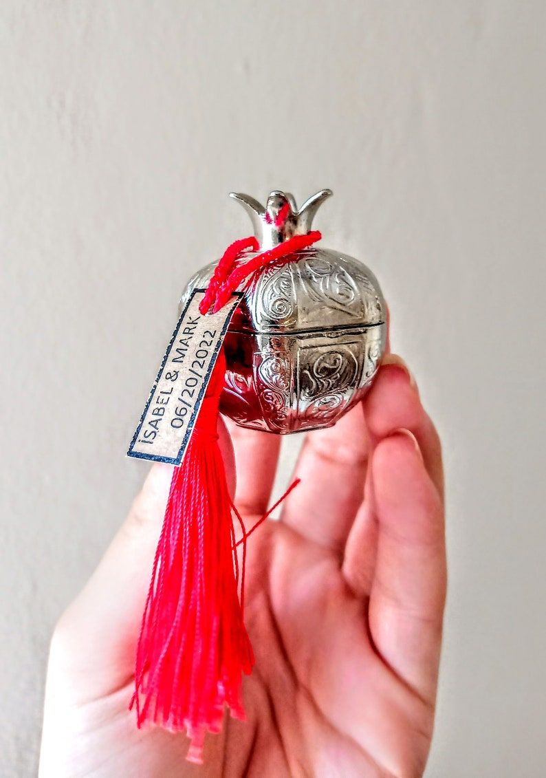Silver pomegranate trinket dish wedding favor with personalised tag from Andalusia Spain